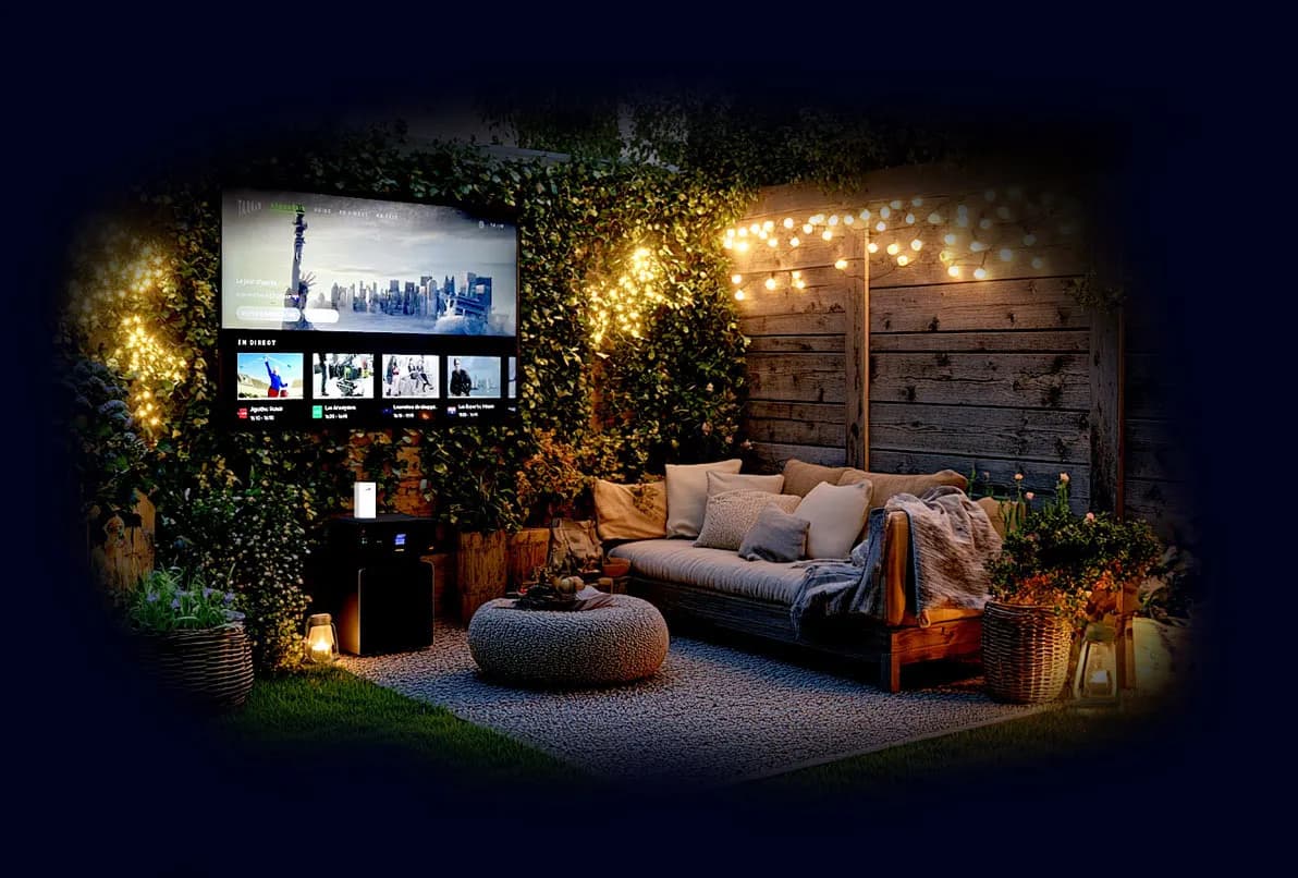 Projector set-up with TADAAM in a garden.