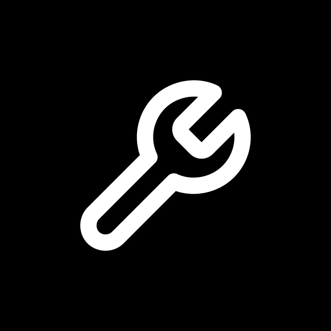 white icon of spanner